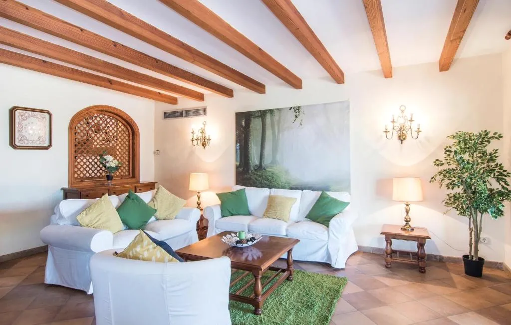 Living room with sofas and exposed ceiling beams